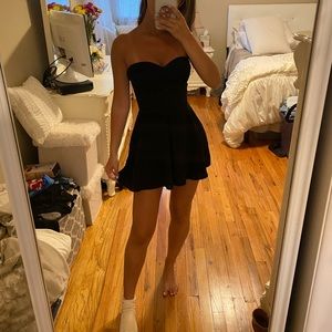 Strapless black romper with lace sides & back